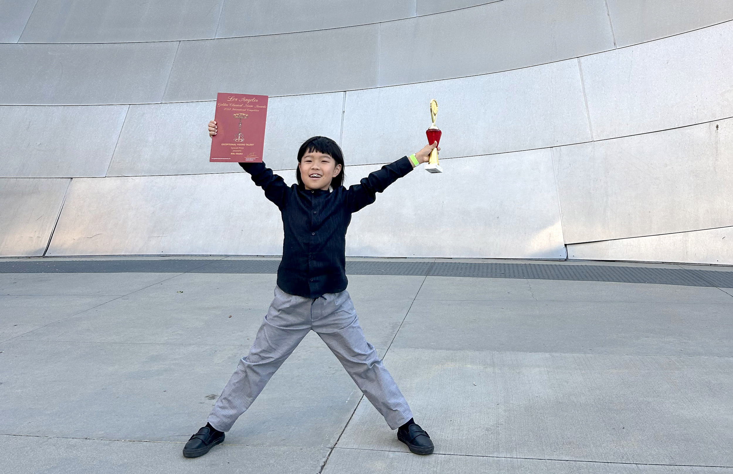 boy with award